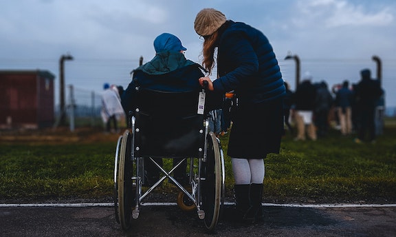 two women, one is in a wheelchair